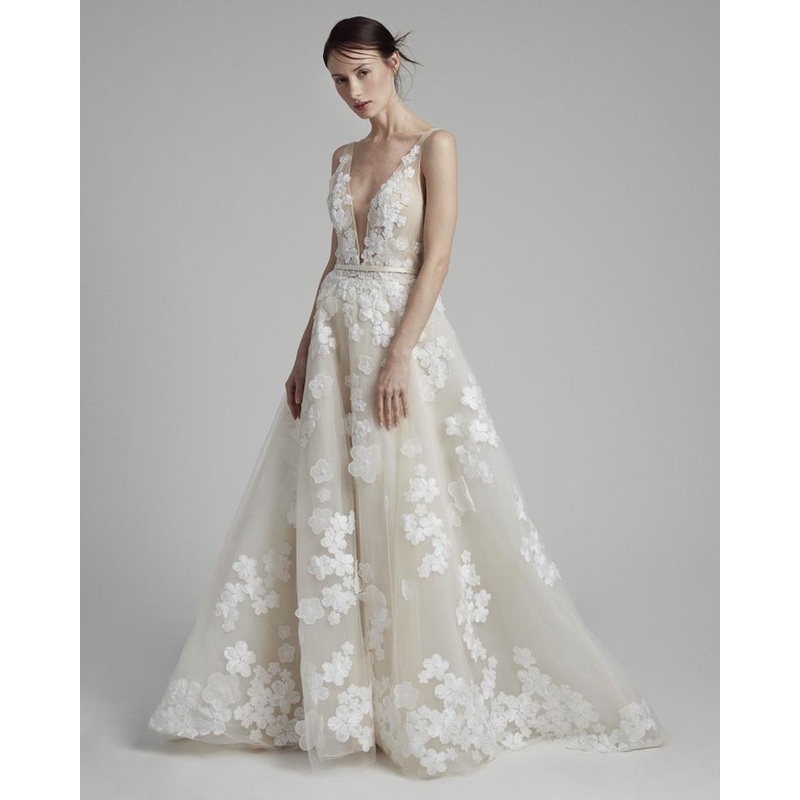 A-line silhouette and plunging V-neck with floral laces and beaded 3D flowers over the entire dress